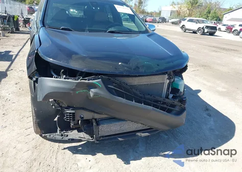 2018 Chevrolet Equinox Premier z USA, uszkodzony, nr VIN 2GNAXWEX9J6219922